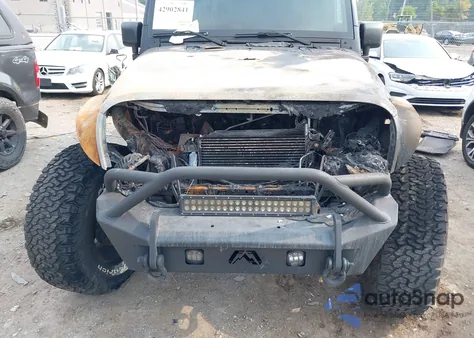 2012 Jeep Wrangler Unlimited Sport z USA, uszkodzony, nr VIN 1C4BJWDG9CL182560